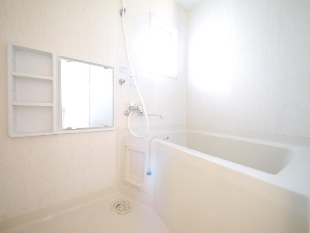 Bath. There is a window in the bathroom