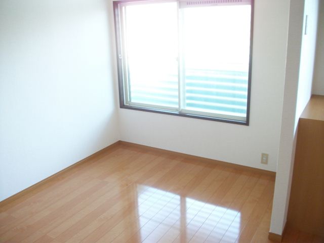 Living and room. Flooring is shiny