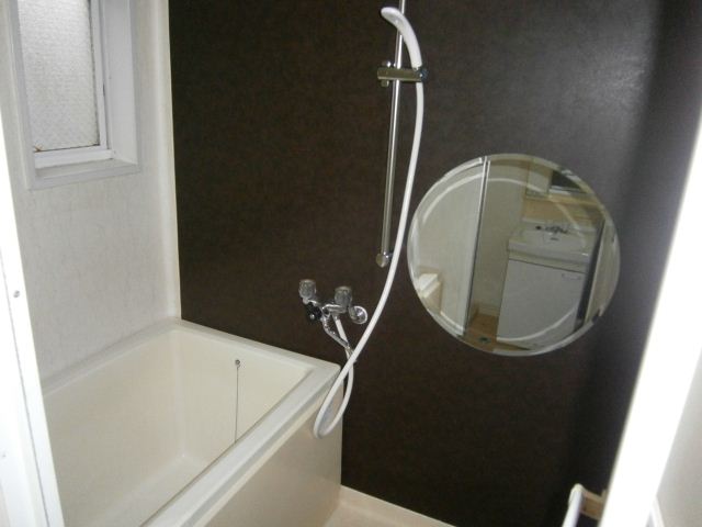 Bath. Round mirror of stylish atmosphere