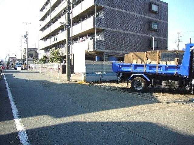 Local photos, including front road. Adjacent road (south 6m public road)