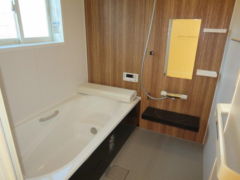 Bathroom. The design of the bathroom also woodgrain