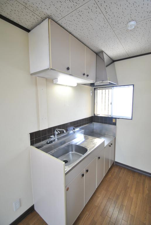 Kitchen. There is a window in the bright kitchen!