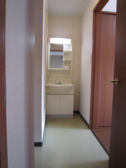 Washroom. It is equipped with dressing room