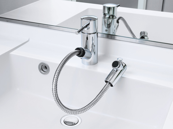 Bathing-wash room.  [Pull-out type faucet] Since the spout can be used in a drawer, vase ・ It is useful, for example, a bucket of water bowl and wash bowl of clean.