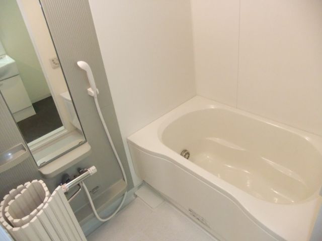 Bath. It is a photograph of another in Room. Please refer to.