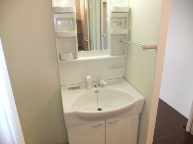 Washroom. It is a photograph of another in Room. Please refer to.