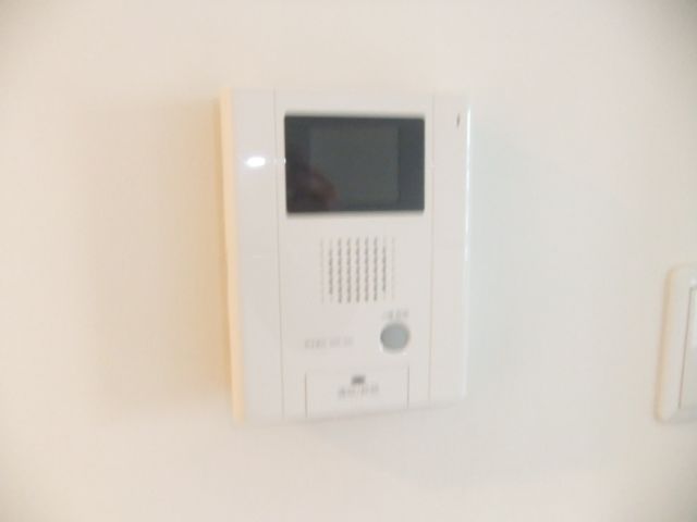 Security. It is a photograph of another in Room. Please refer to.