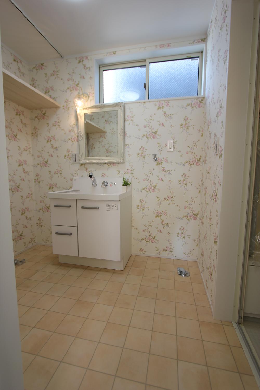 Wash basin, toilet. Spacious washroom there is also a storage space