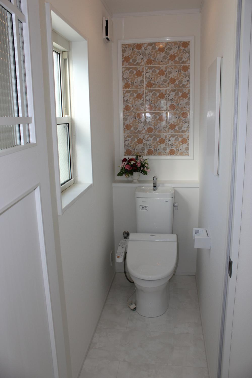 Toilet. Accent tiles cute toilet