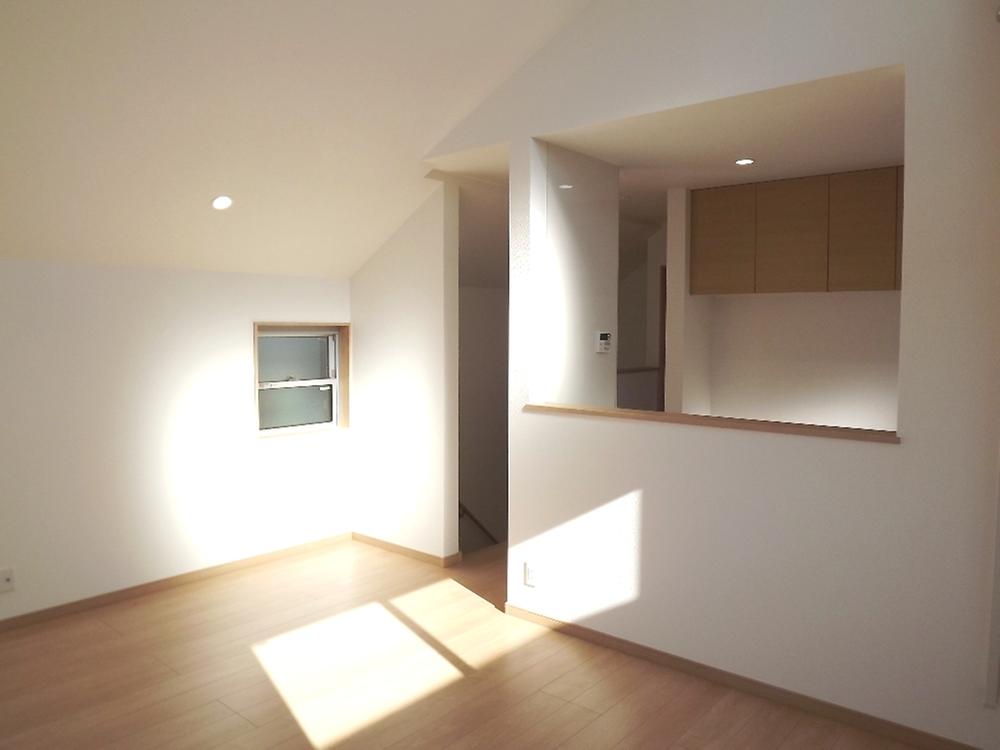 Living. A vaulted ceiling living-dining (upper loft)