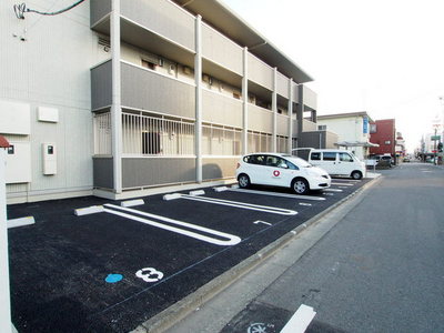 Building appearance. Parking lot