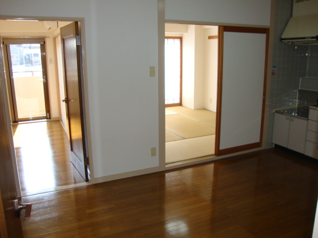 Living and room. Kitchen and the room viewed from the hallway