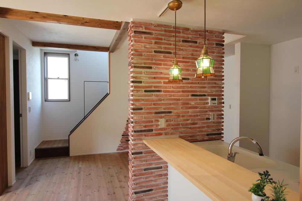 Living. Brick walls with a taste in stylish kitchen counter. Glass pendant light and is nicknamed preeminent.