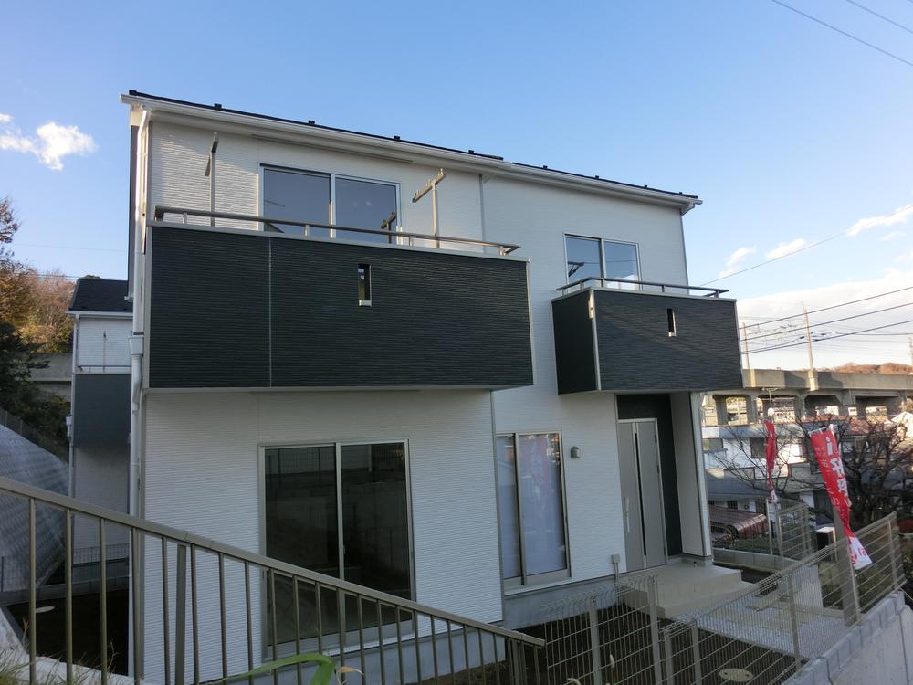 Local appearance photo. All six buildings of new homes.