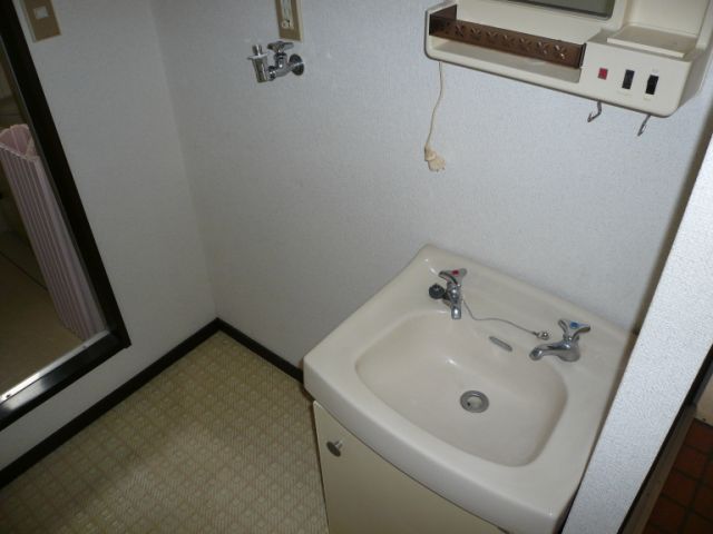 Washroom. There is a separate wash basin is room