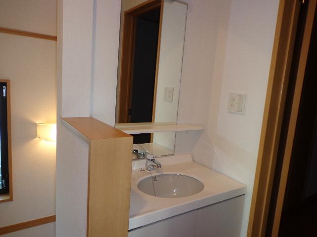 Wash basin, toilet. There are also vanity on the second floor. 