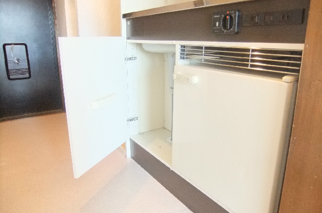 Other Equipment. Refrigerator and kitchen under storage