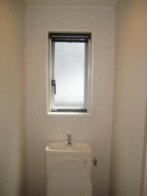 Toilet. Is also one of the point of there is a window in the toilet.