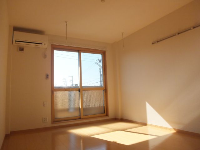 Living and room. It is a sunny room