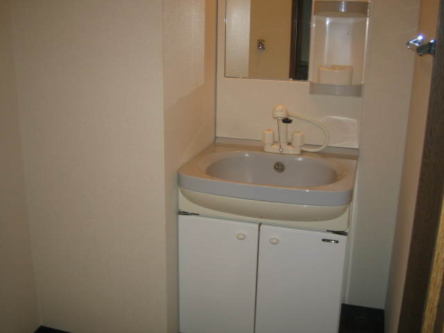 Washroom. This basin dressing room. Basin of the shower function