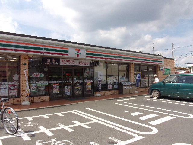 Convenience store. Seven-Eleven Oak table Komae store up (convenience store) 330m