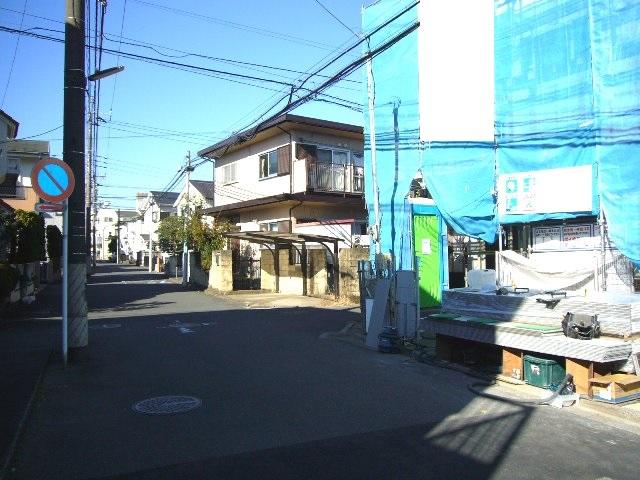 Local photos, including front road. Adjacent road (southwest side 6.7m public road)