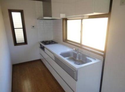 Kitchen. Bright kitchen where the light is coming through the window frame! 