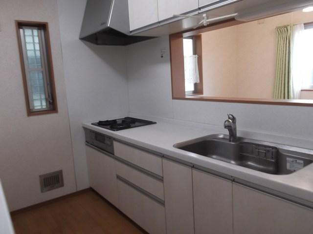 Kitchen. White was the keynote kitchen. Bright and there is a feeling of cleanliness. 