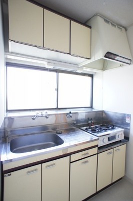 Kitchen. It is also a two-burner gas stove installed already to get on kitchen storage-rich dishes! 