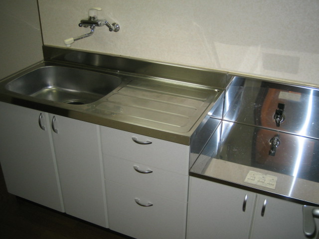 Kitchen. Two-burner stove is put kitchen.