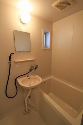 Bath. Also is easy ventilation with a wash basin with bathroom small window