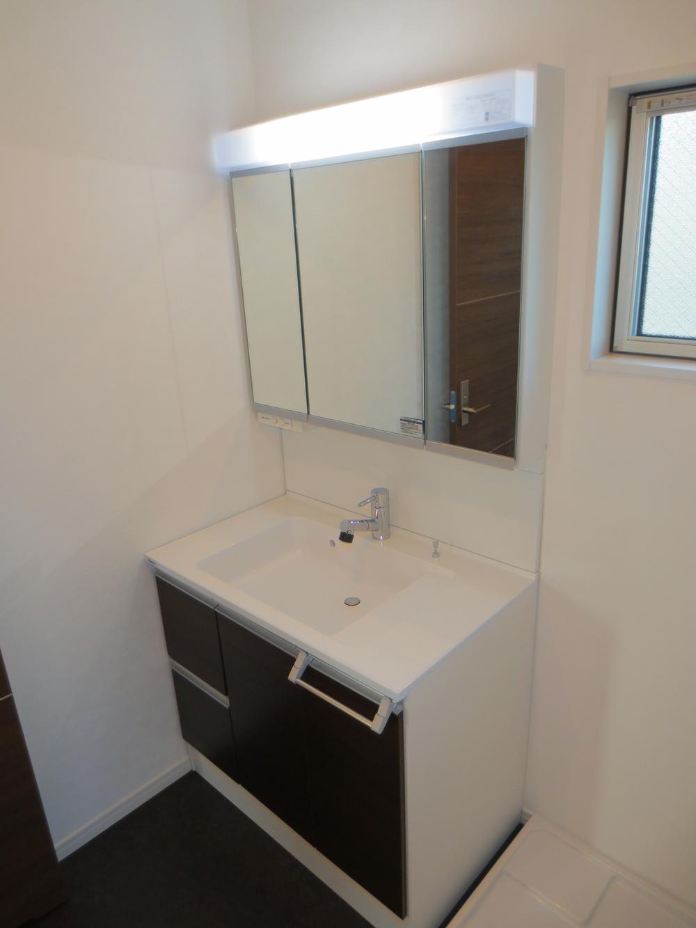 Other Equipment. Three-sided mirror vanity dressing