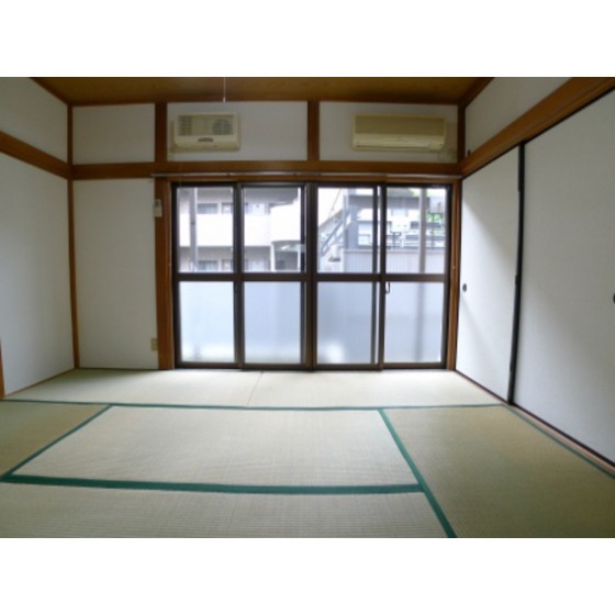 Other room space. The window is large, bright room.