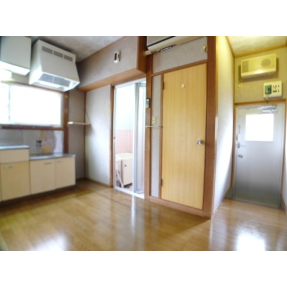 Living and room. There is also a window is bright ventilated kitchen.