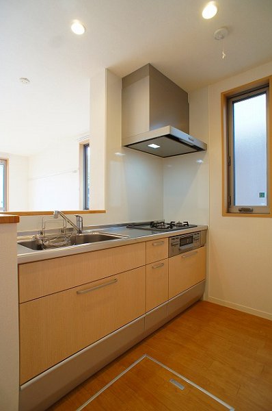 Kitchen. Convenient face-to-face kitchen to clean up the back or carry a cuisine.