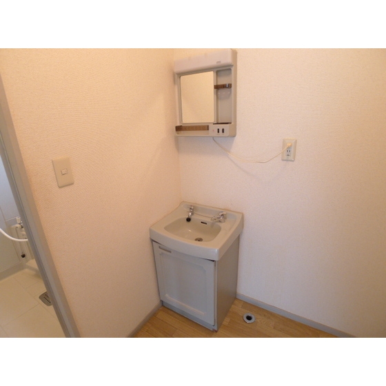 Washroom. Masu role stand to get dressed check because it is with mirror.