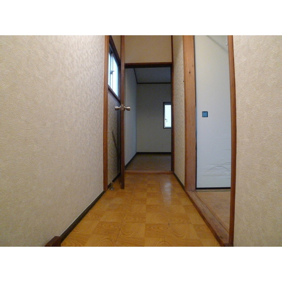 Other room space. The corridor leading to the second floor of each chamber.