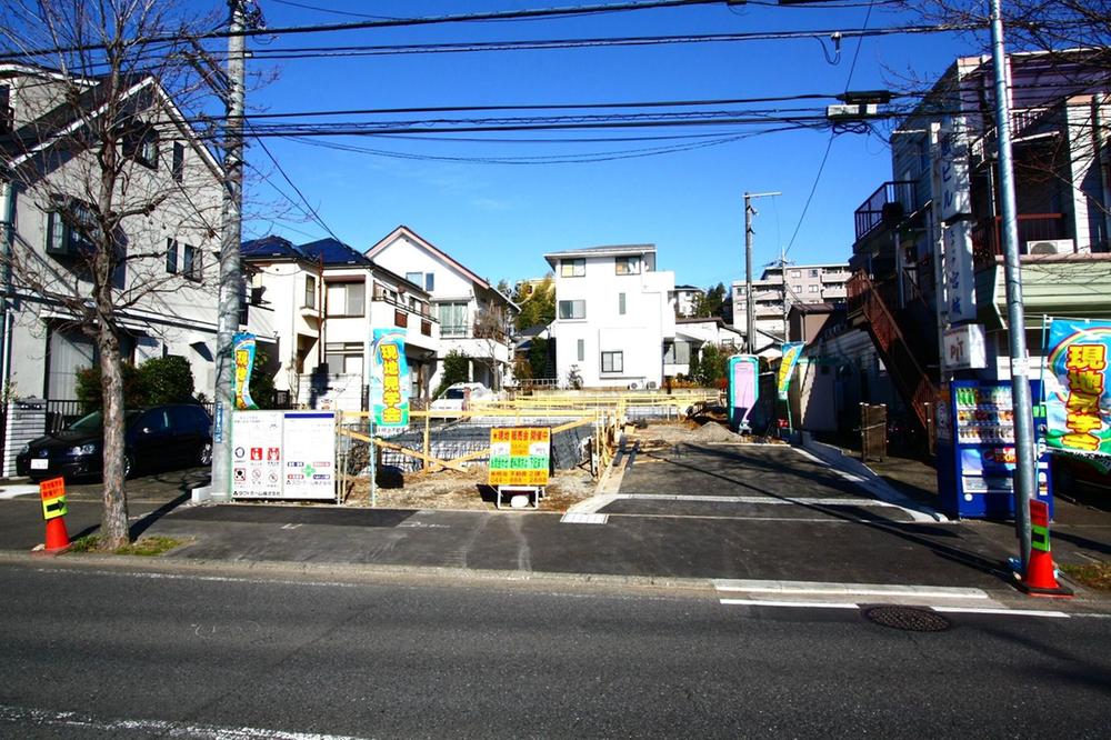 Local photos, including front road. This property along the tree-lined street.