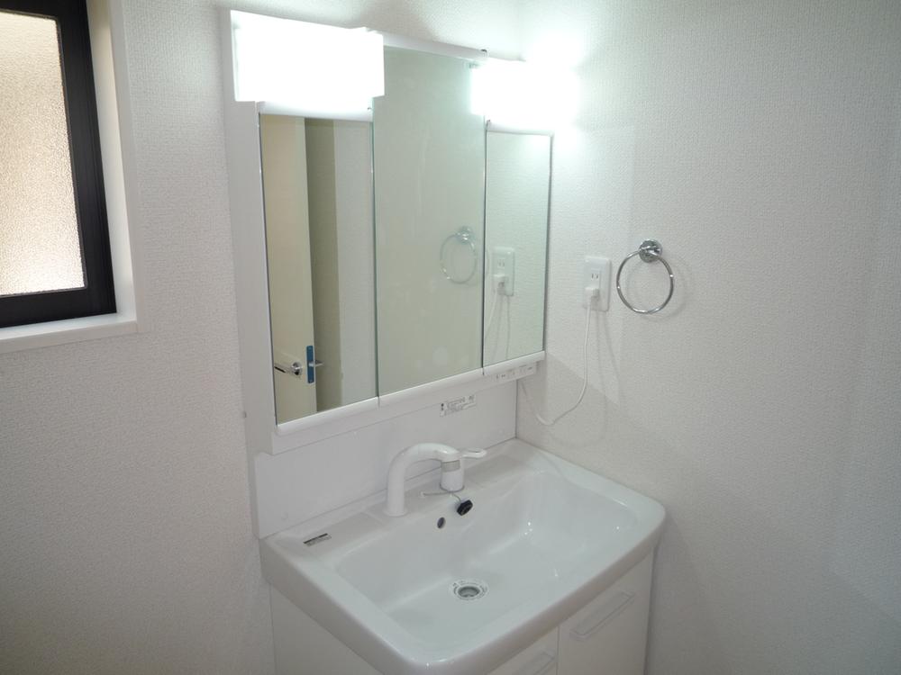 Wash basin, toilet. Vanity is vanity shower.