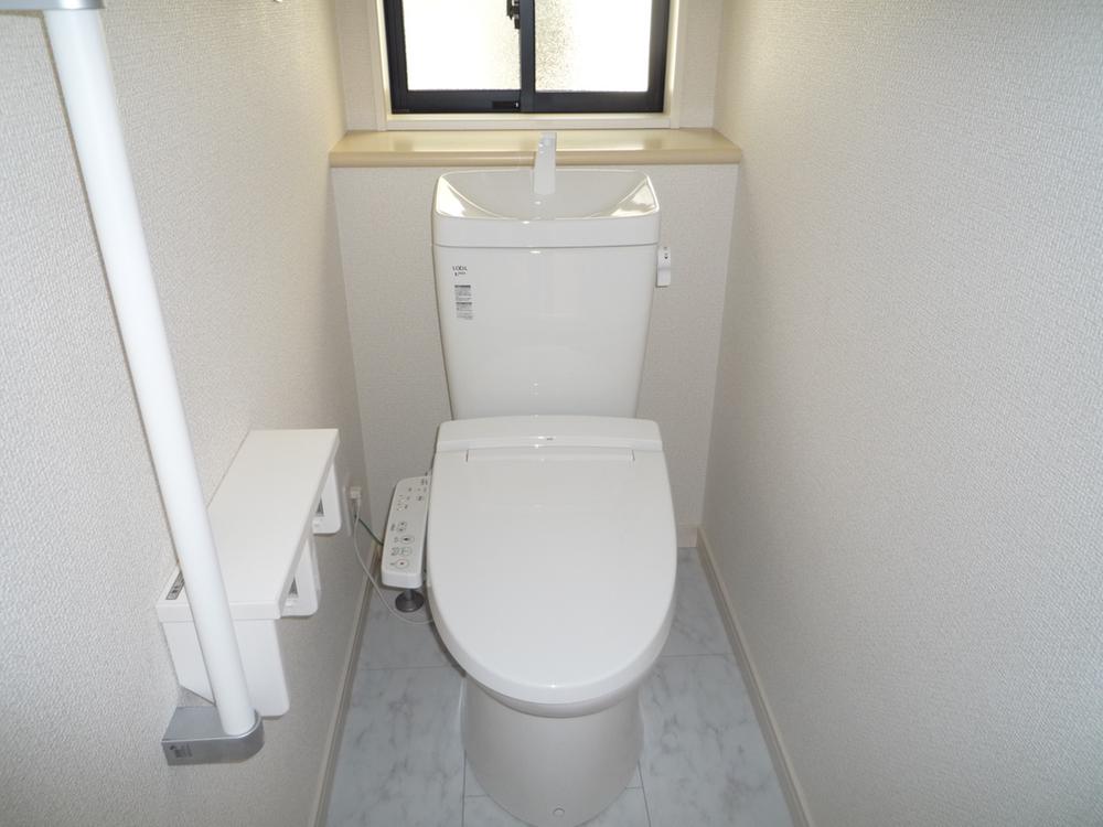 Toilet. Toilet is equipped with cleaning function.