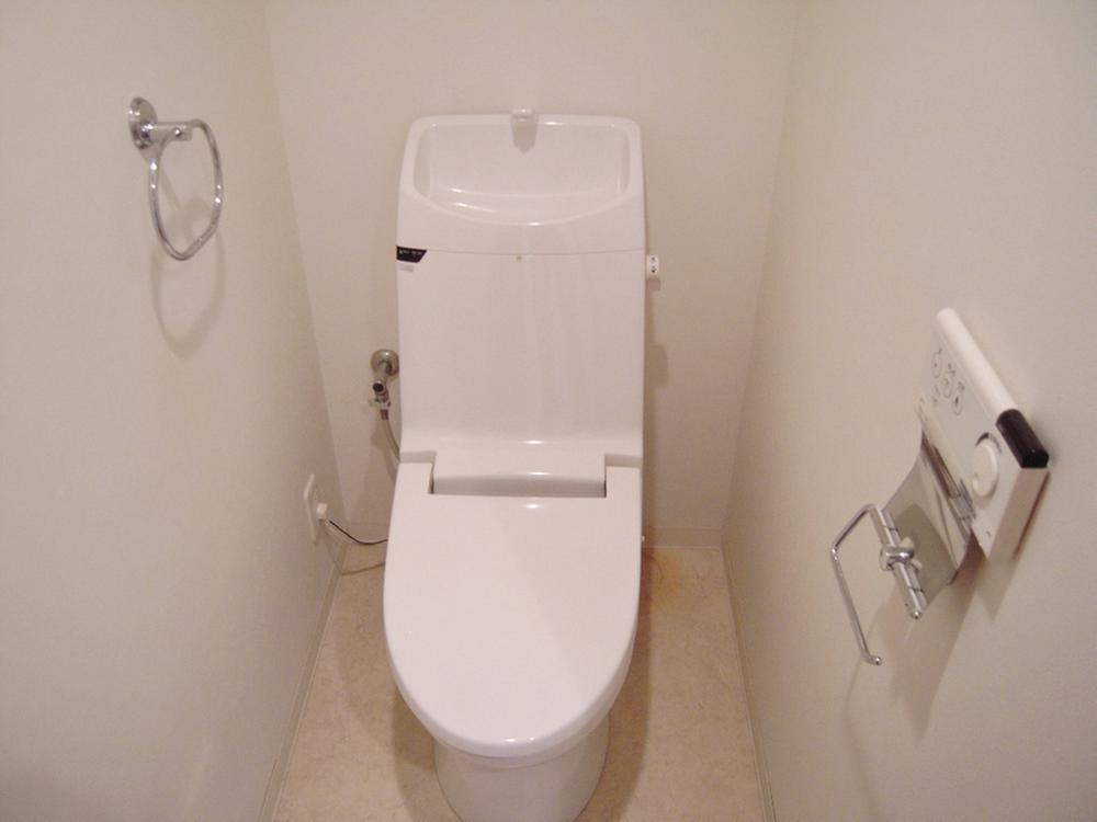 Toilet. It is with remote-control washing machine