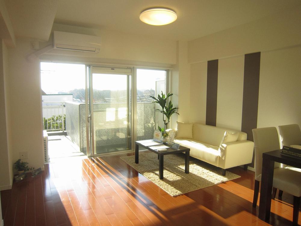 Living. Is a bright living room is furnished housing & sunshine enter