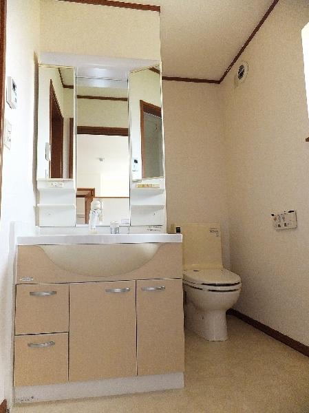 Toilet. Second floor of the toilet is a washbasin.