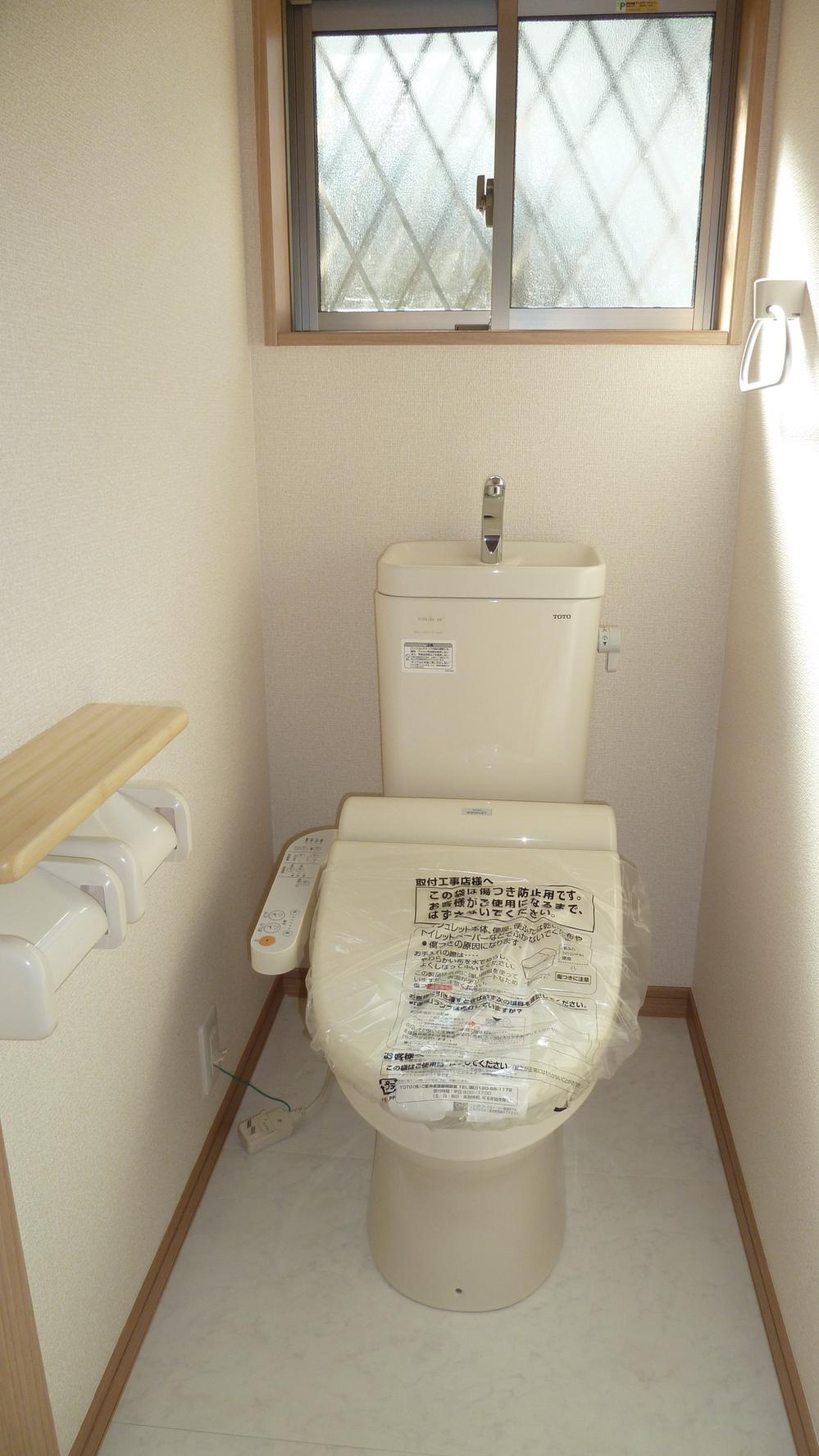 Toilet. Warm water washing toilet seat on each floor both