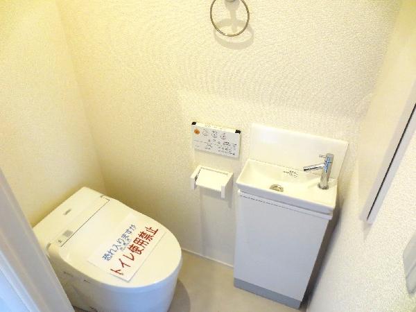 Toilet. It will be in the toilet of 1F.