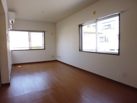 Living and room. It is a bright room there is a window in the top floor room angle.