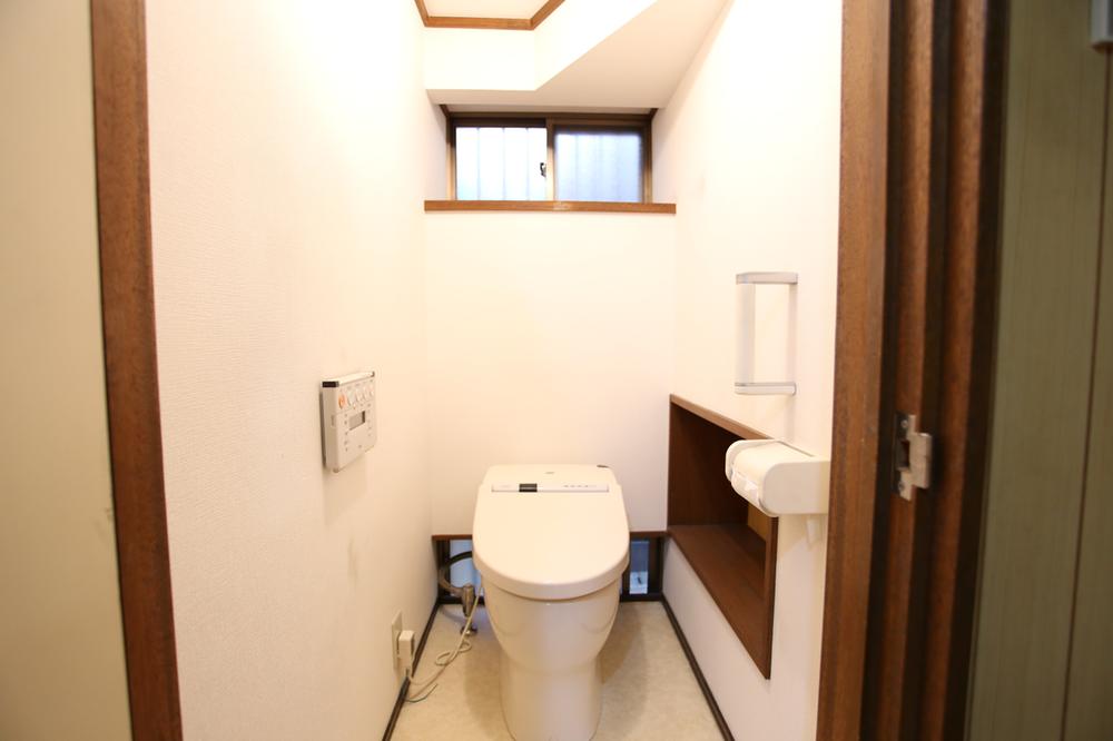 Toilet. With shelf