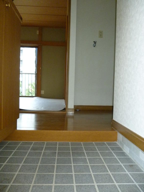 Entrance. Same building Separate reference photograph