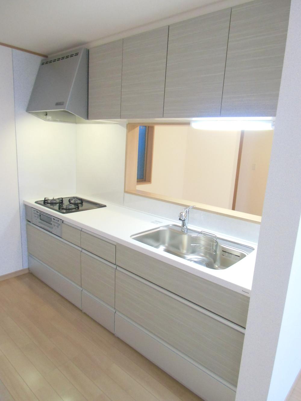 Kitchen. Adopt the artificial marble counter to slide cabinet