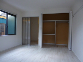 Living and room. White the keynote and the flooring of the Western-style